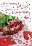 This anniversary card image presents an elegant still life that feels both personal and celebratory, as though carefully arranged for a special evening in Muswell Hill. At its centre, a bouquet-style cluster of red roses spills gently across the surface, each blossom full and velvety, with petals curling outward in generous spirals. The roses' deep crimson hue is rich and romantic, softened by the way the light grazes the petal edges, making them appear as though they've been lightly kissed by morning dew. Around and beneath the flowers, soft green foliage peeks through, adding texture and a sense of freshness reminiscent of nearby gardens and leafy corners around Alexandra Palace and its surrounding slopes. Positioned close to the blooms, a heart-like or elegantly shaped jewellery box in vivid red stands out, its surface gleaming subtly under the soft light. Resting near it is a piece of fine jewellery, perhaps a pendant or bracelet, its shining metal and delicate design suggesting a treasured anniversary gift. The smooth background is sprinkled with tiny hearts and sparkling accents that shimmer like scattered confetti, enhancing the mood of quiet celebration. A single butterfly motif drifts among these decorative details, lending an air of whimsy and lightness. Graceful, handwritten-style text curves across the card, adding a sense of intimacy, as if the words were penned especially for one beloved person. The lighting is gentle and even, creating soft shadows and a comforting glow that bathes the entire scene. Together, the roses, keepsakes, and delicate embellishments form a heartfelt tribute to enduring love - a perfect companion to an anniversary bouquet delivered to a doorstep in Muswell Hill.